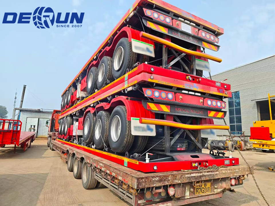 Telung set trailer semi sing rata bakal dikirim menyang Zambia