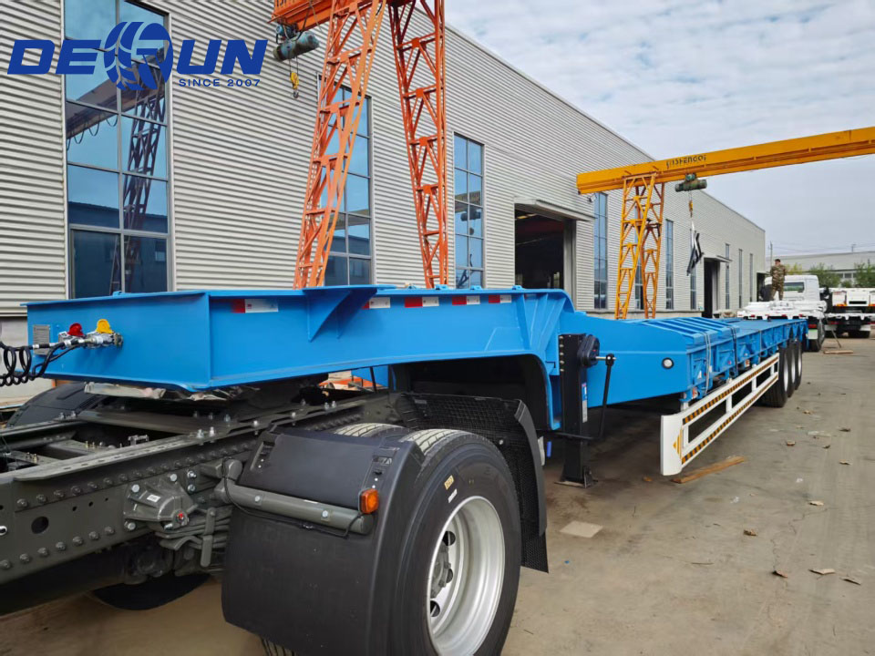 Loro treler semi-rendah sing kurang telung-axle bakal dikirim menyang Afrika Kulon.