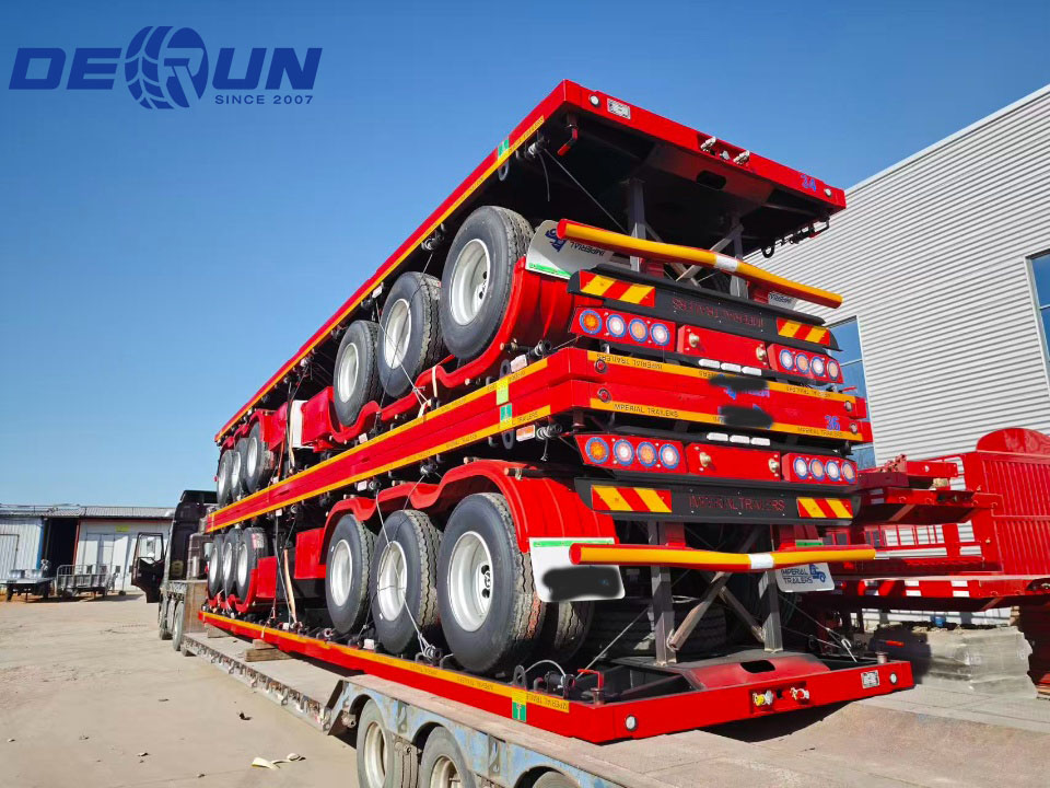 Telung truk cilik gandar ngisor sing bakal dikirim menyang Mauritania.